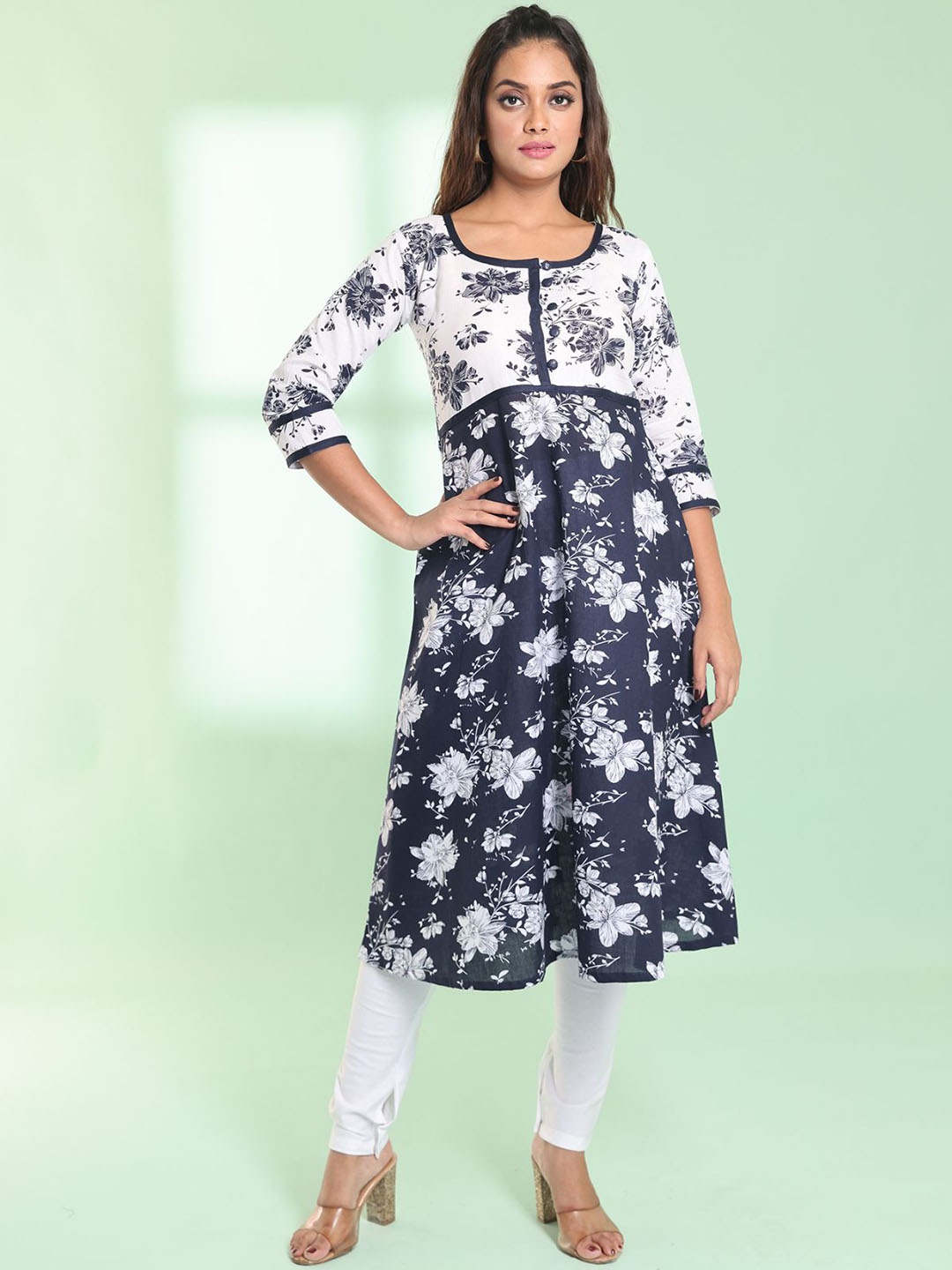 

Charukriti Women Floral Printed Regular Pure Cotton Kurta with Churidar, Navy blue