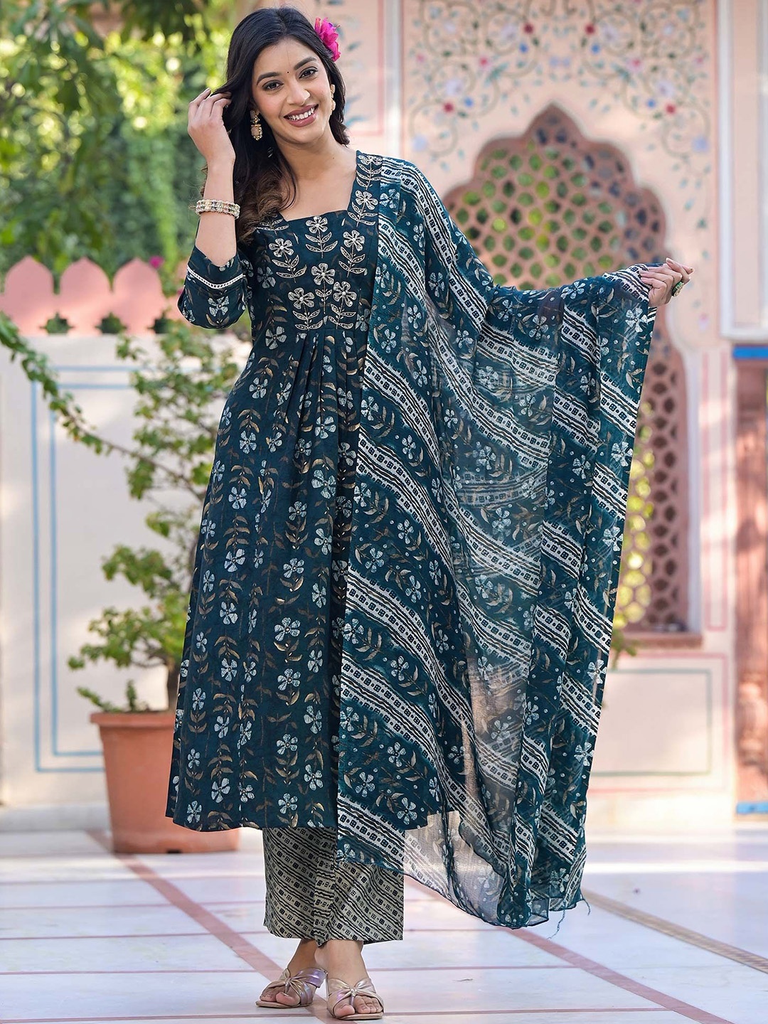 

Peachmode Women Floral Printed Regular Sequinned Chanderi Silk Kurta with Trousers & With Dupatta, Teal