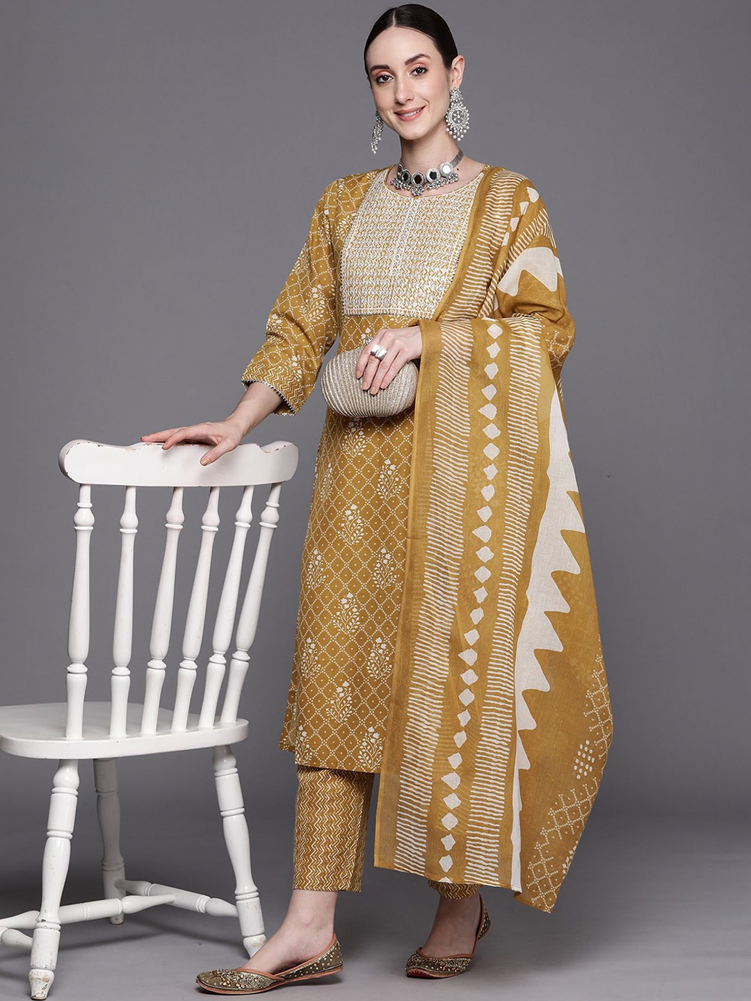 

Indo Era Women Ethnic Motifs Printed Regular Thread Work Pure Cotton Kurta with Trousers & With Dupatta, Mustard