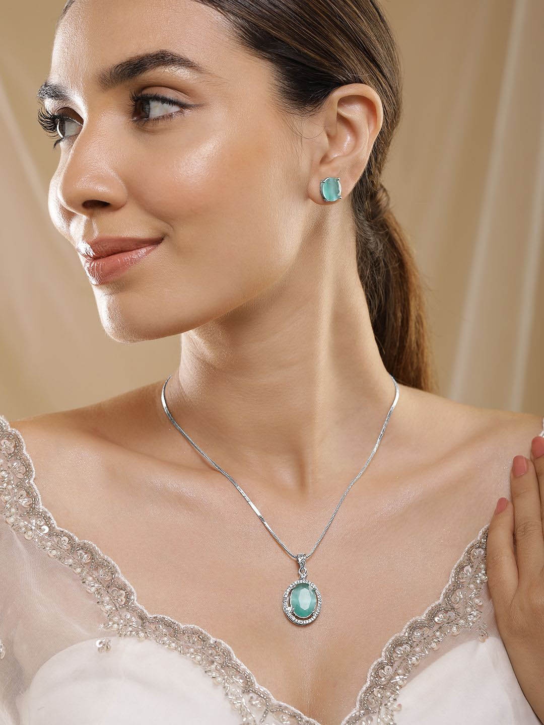 

Rubans Rhodium Plated Mint Green & CZ Studded Oval Pendant Necklace Set, Silver