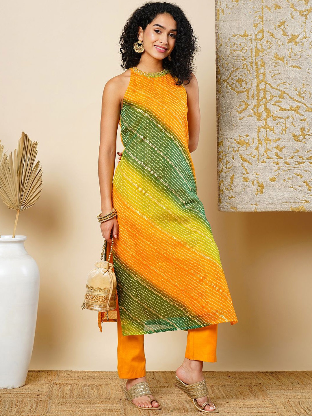 

Globus Women Bandhani Printed Regular Thread Work Kurta with Trousers, Mustard
