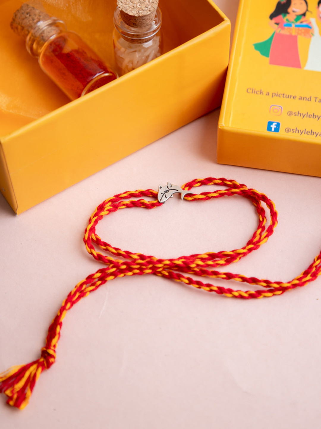 

Shyle Thread Rakhi, Silver