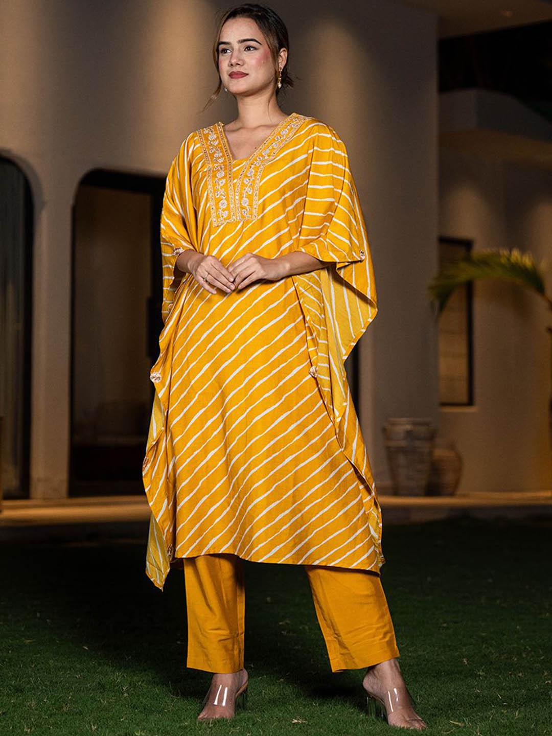 

Yufta Women Leheriya Striped Regular Thread Work Kurta with Trousers, Mustard