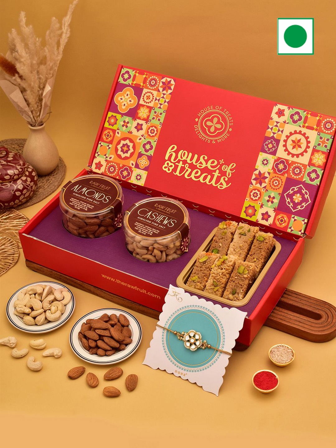 

RawFruit 4-Pcs Sweets & Dry Fruits With 1 Rakhi, Red