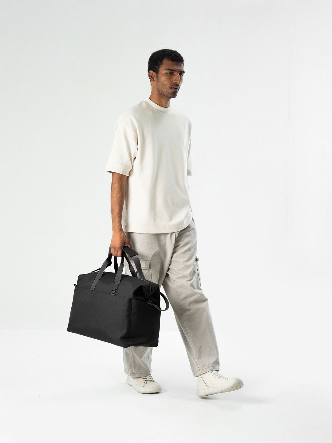 

DailyObjects Textured Oversized Shopper Handheld Bag with Tasselled, Black