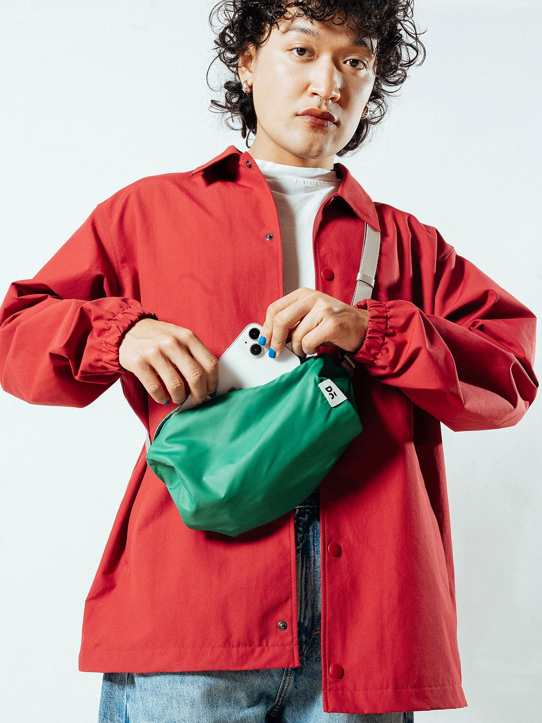 

DailyObjects Structured Handheld Bag with Tasselled, Green