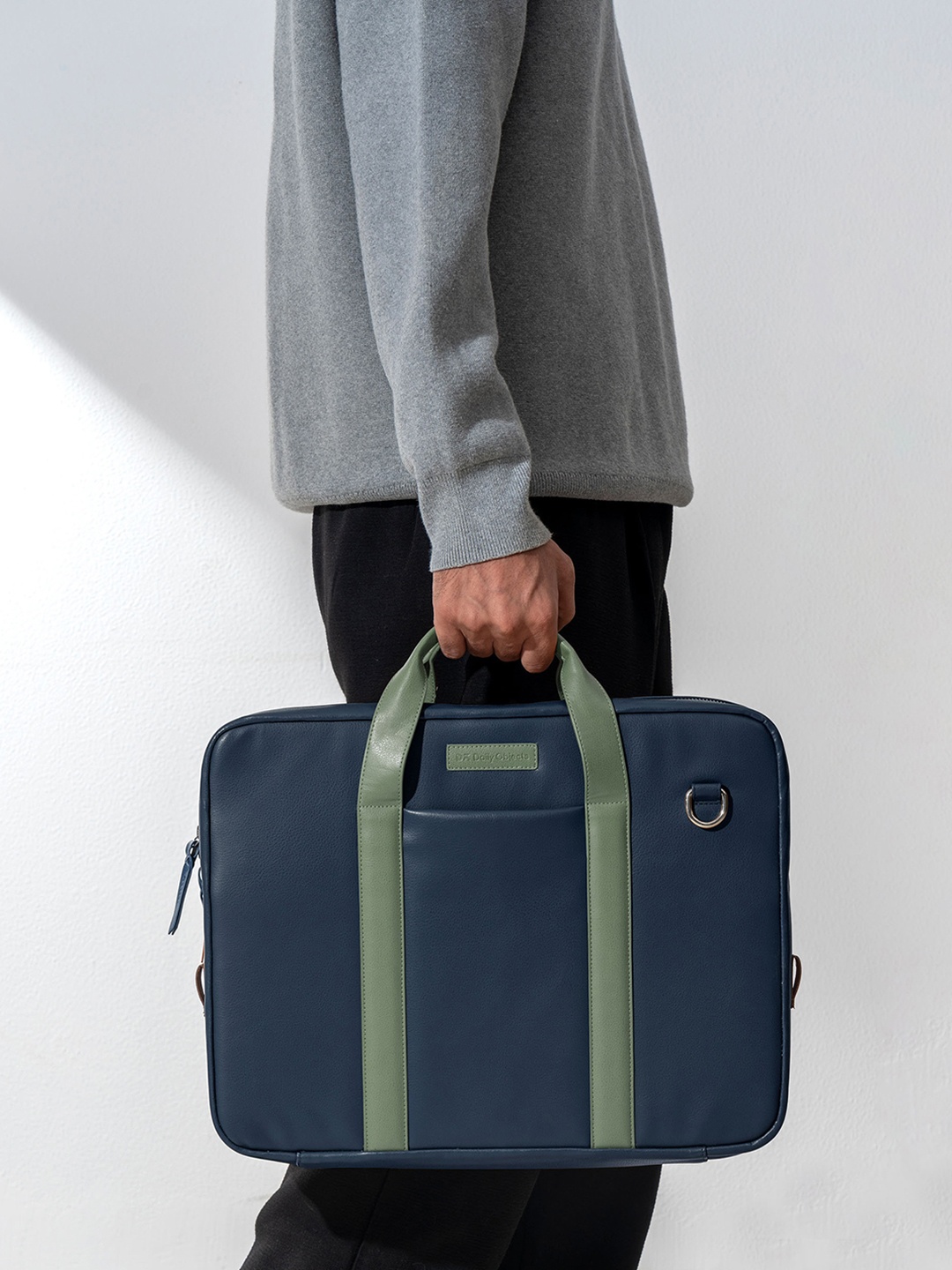 

DailyObjects Structured Handheld Bag with Tasselled, Blue