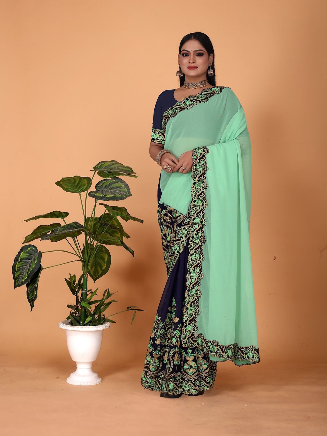 

Celeb Styles Embellished Embroidered Pure Georgette Half and Half Saree, Green