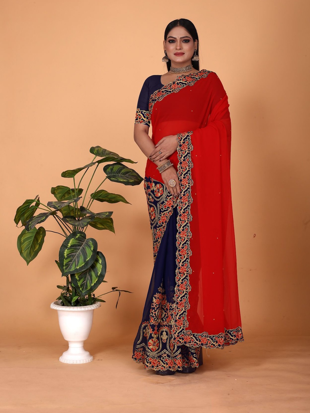 

Celeb Styles Embroidered Pure Georgette Half and Half Saree, Red