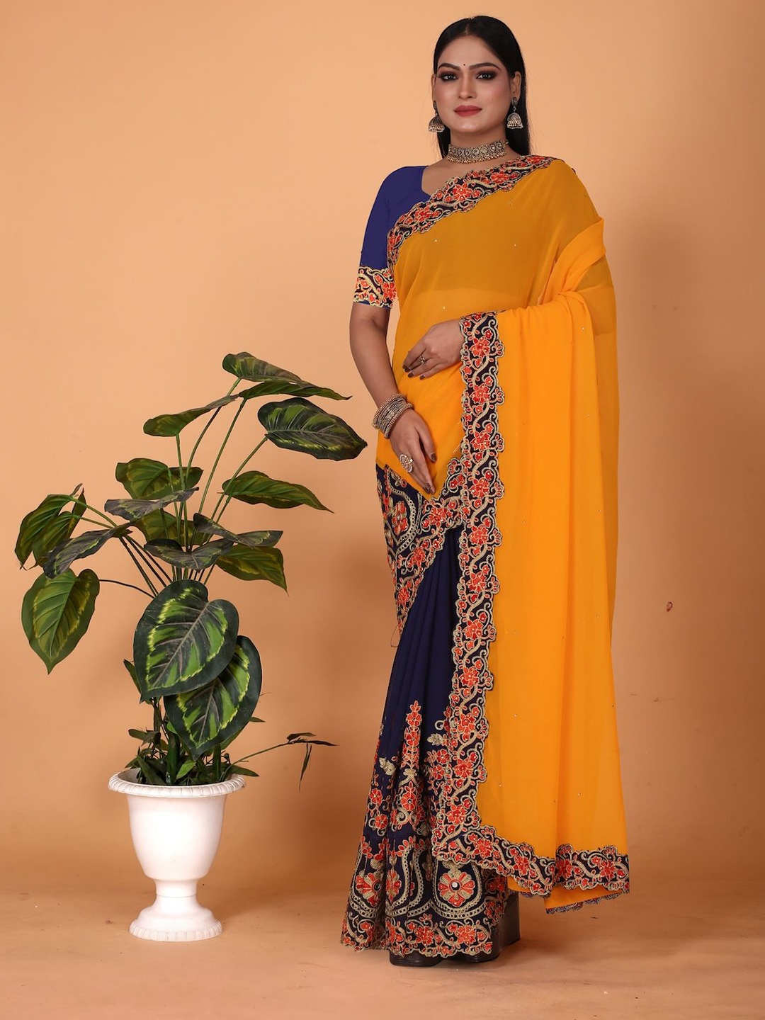 

Celeb Styles Polka Dot Embroidered Pure Georgette Half and Half Saree, Yellow
