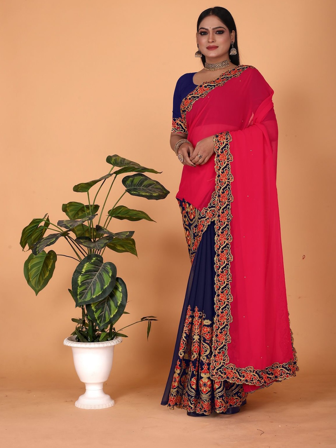 

Celeb Styles Ethnic Motifs Embroidered Pure Georgette Half and Half Saree, Pink