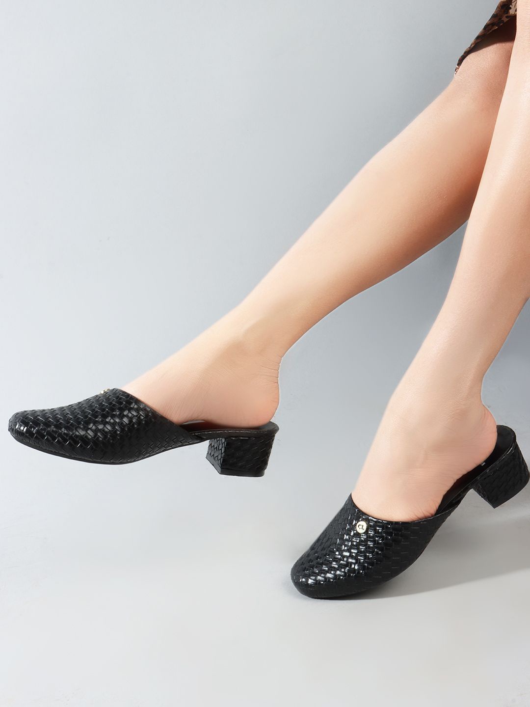 

Carlton London Embellished Pointed Toe Block Pumps With Laser Cuts, Black