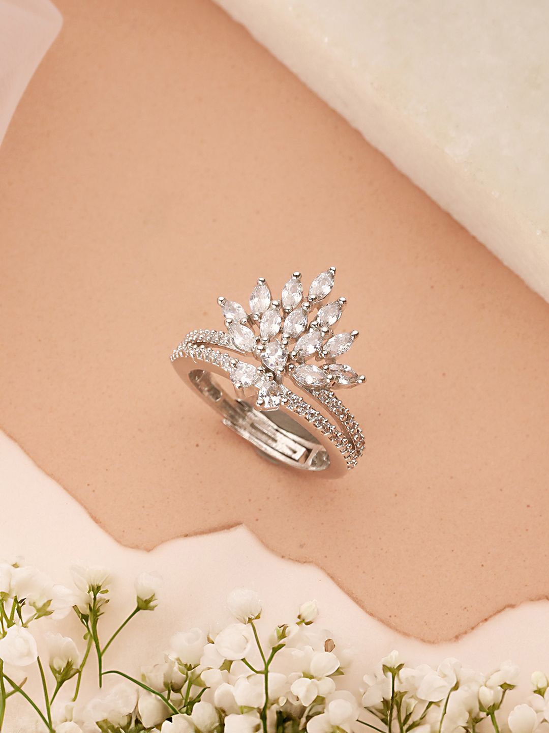 

Saraf RS Jewellery Silver Plated American Diamond Studded Crown Shaped Finger Ring