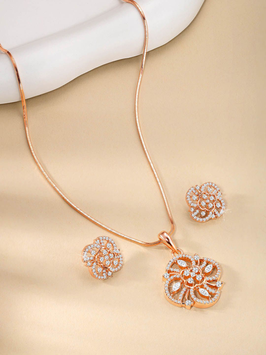 

Peora Rose Gold Plated Cubic Zirconia Studded Floral Pendant Chain & Stud Earrings Set