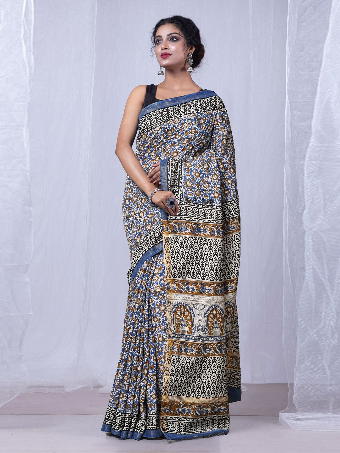 

Unnati Silks Floral Zari Bagru Saree, Blue