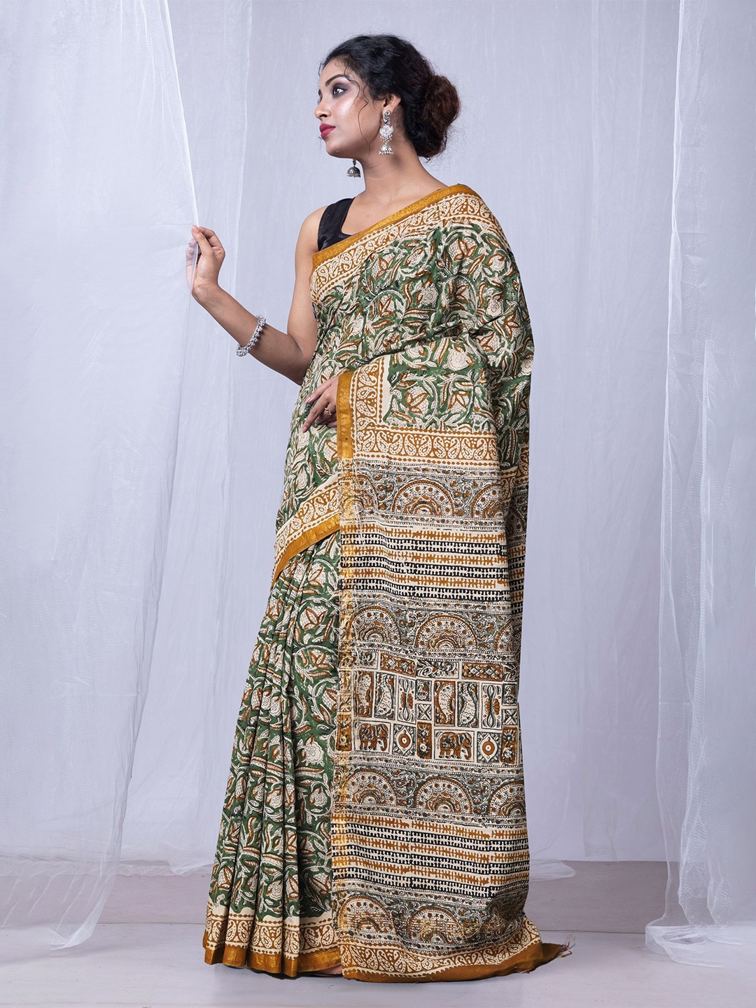 

Unnati Silks Ethnic Motifs Zari Handloom Bagru Saree, Green