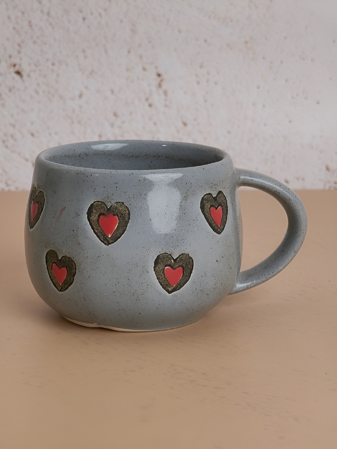 

NURTURE INDIA Grey & Red Printed Ceramic Glossy Mugs 180ml