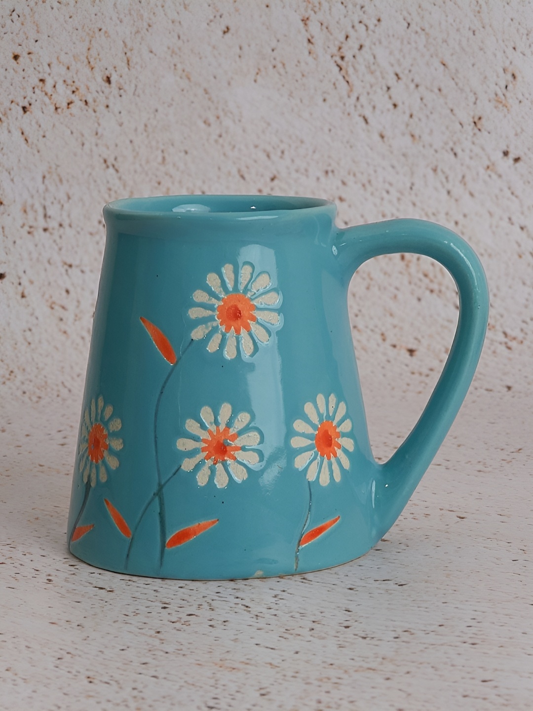 

NURTURE INDIA Blue & Orange Printed Ceramic Glossy Mugs 250 ml