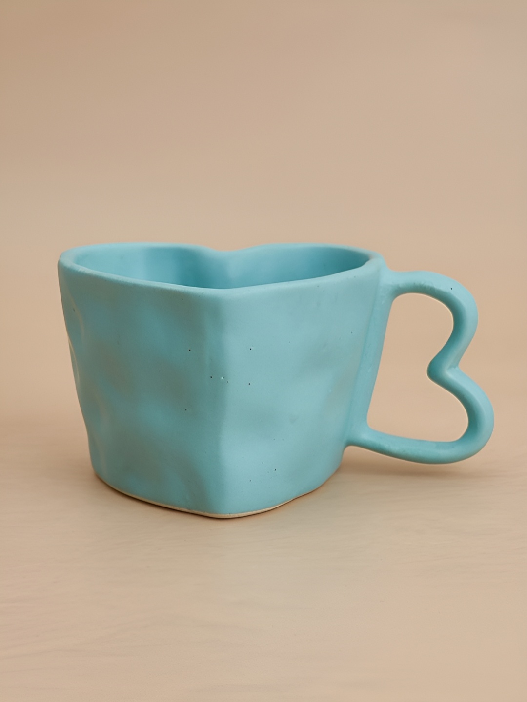 

NURTURE INDIA Blue Textured Ceramic Matte Mugs 300ml