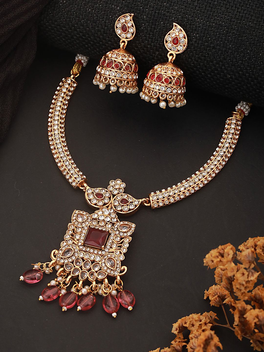 

Saraf RS Jewellery Gold-Plated AD Stone-Studded & Beaded Details Jewellery Set