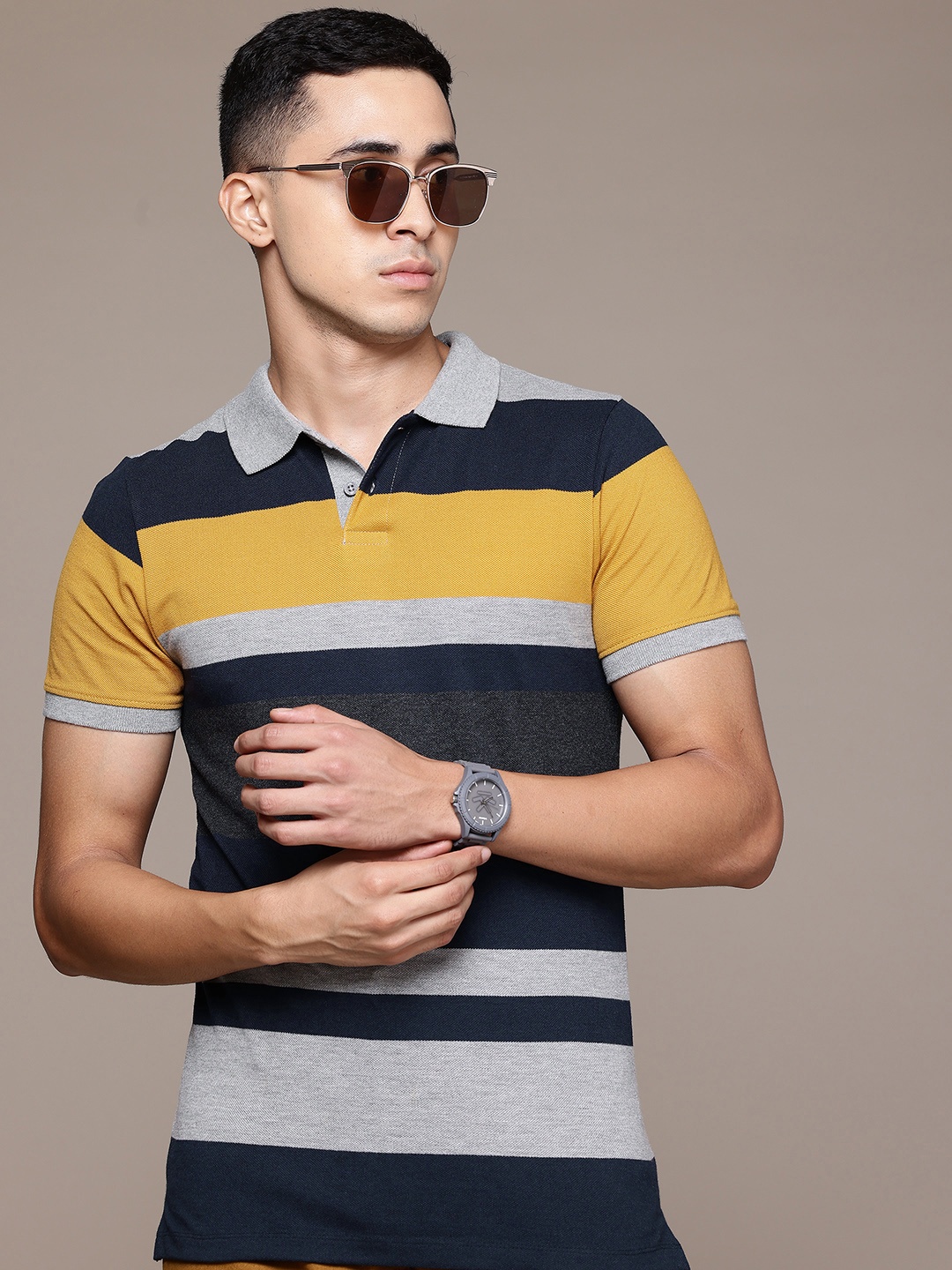 

Roadster Men Striped Polo Collar T-shirt, Multi