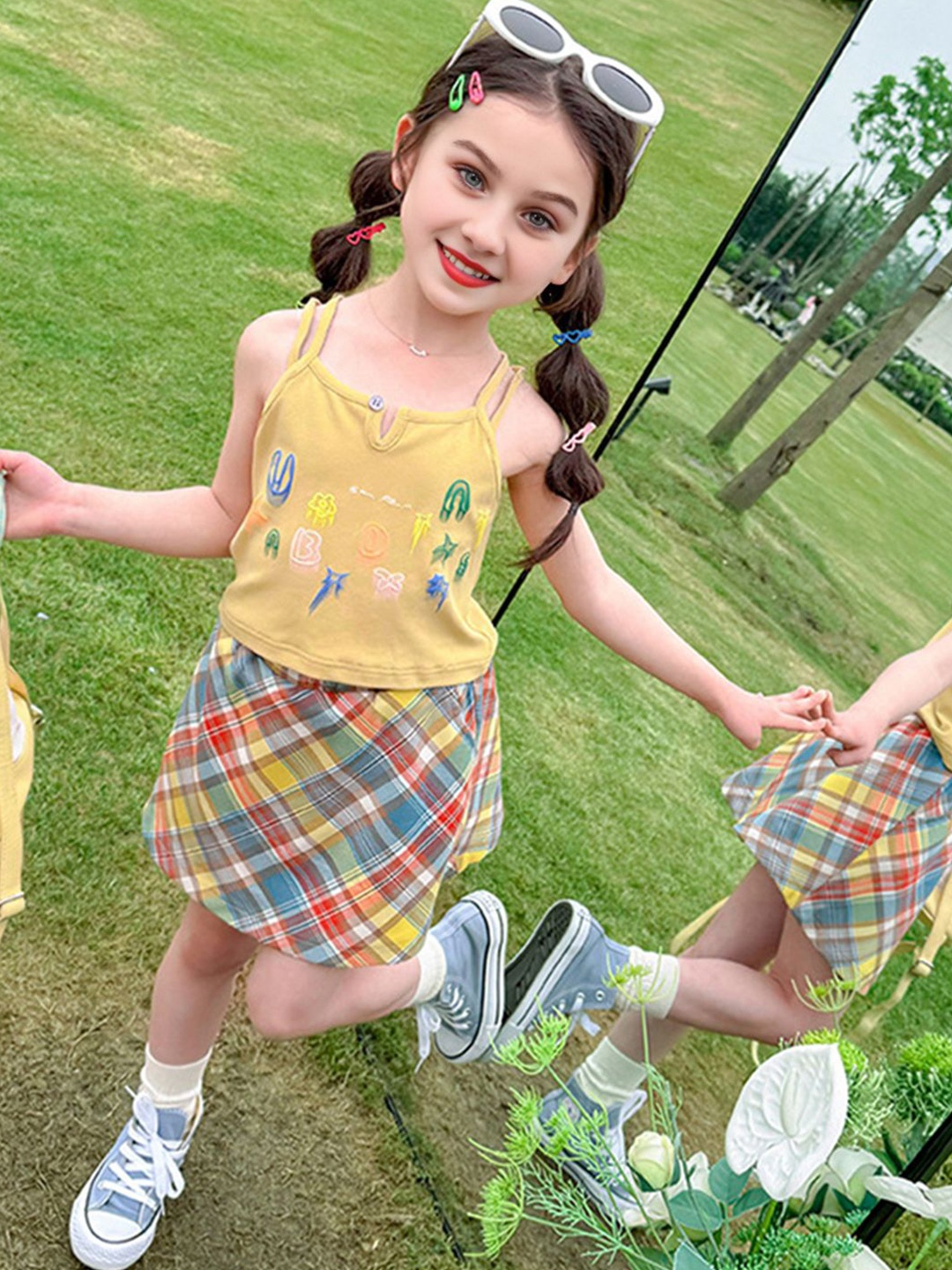 

INCLUD Girls Printed Shoulder Straps Top With Checked Skirt, Yellow