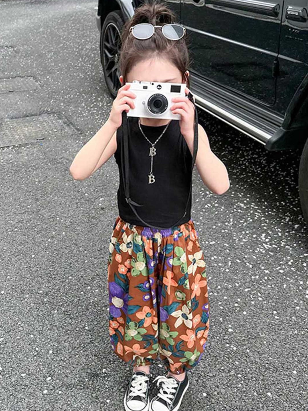 

INCLUD Girls Round Neck Sleeveless Vest Top With Printed Joggers, Black