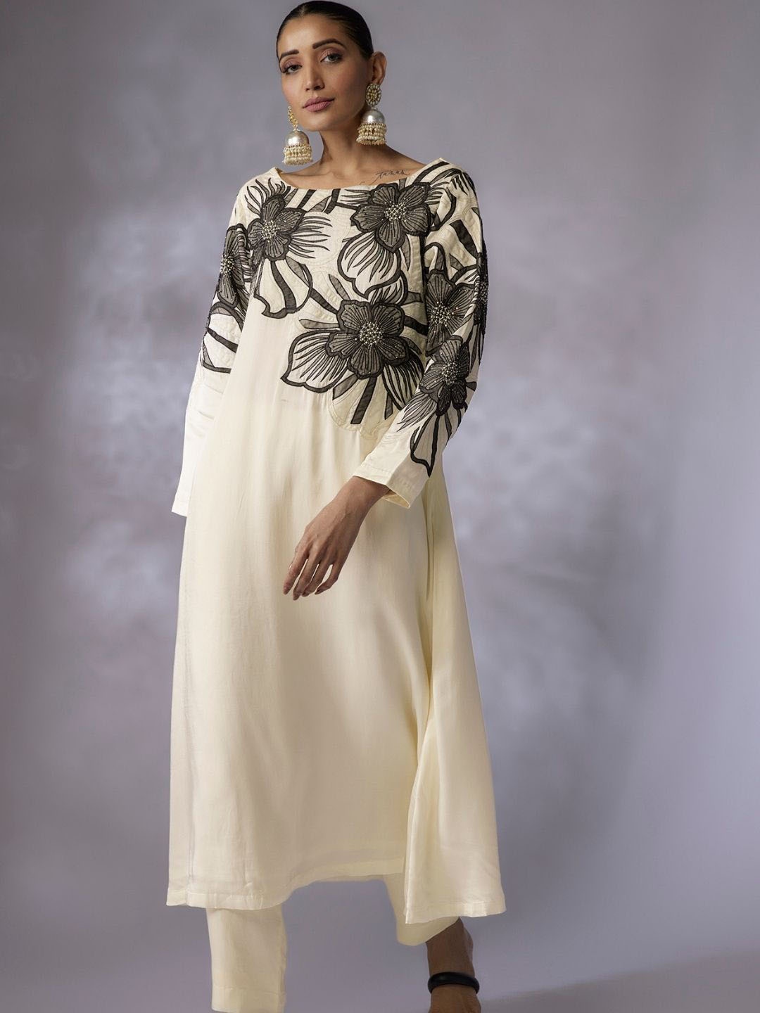 

Shreeka Women Embroidered A-Line Kurta With Trousers Set, Cream