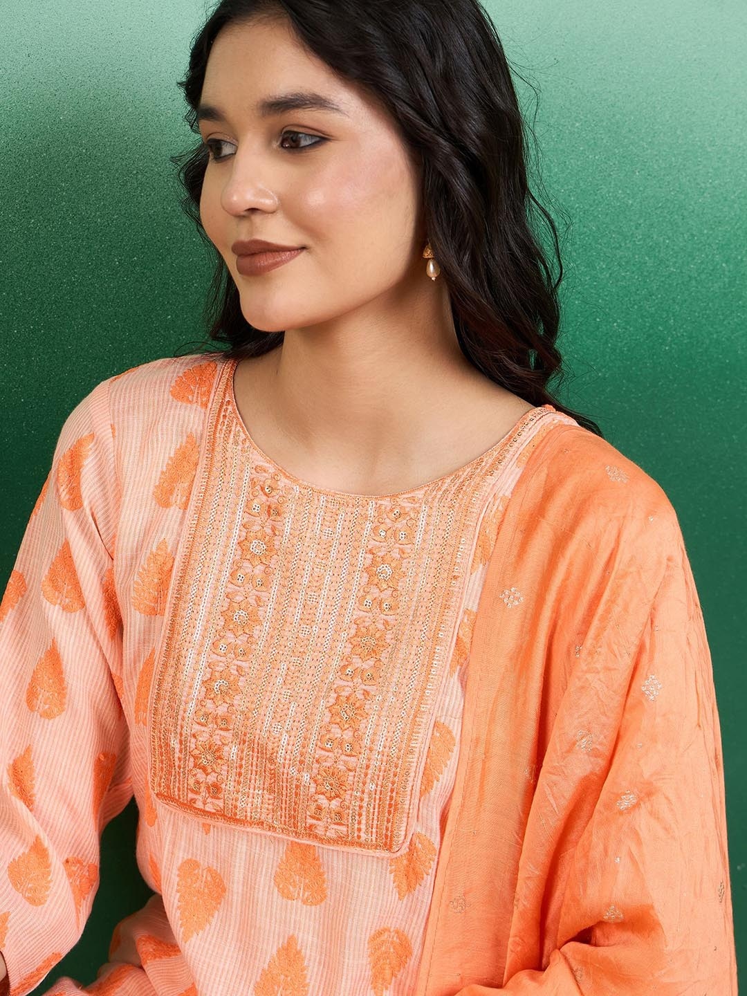 

Sangria Ethnic Motif Printed Round Neck Straight Kurta With Trouser, Orange