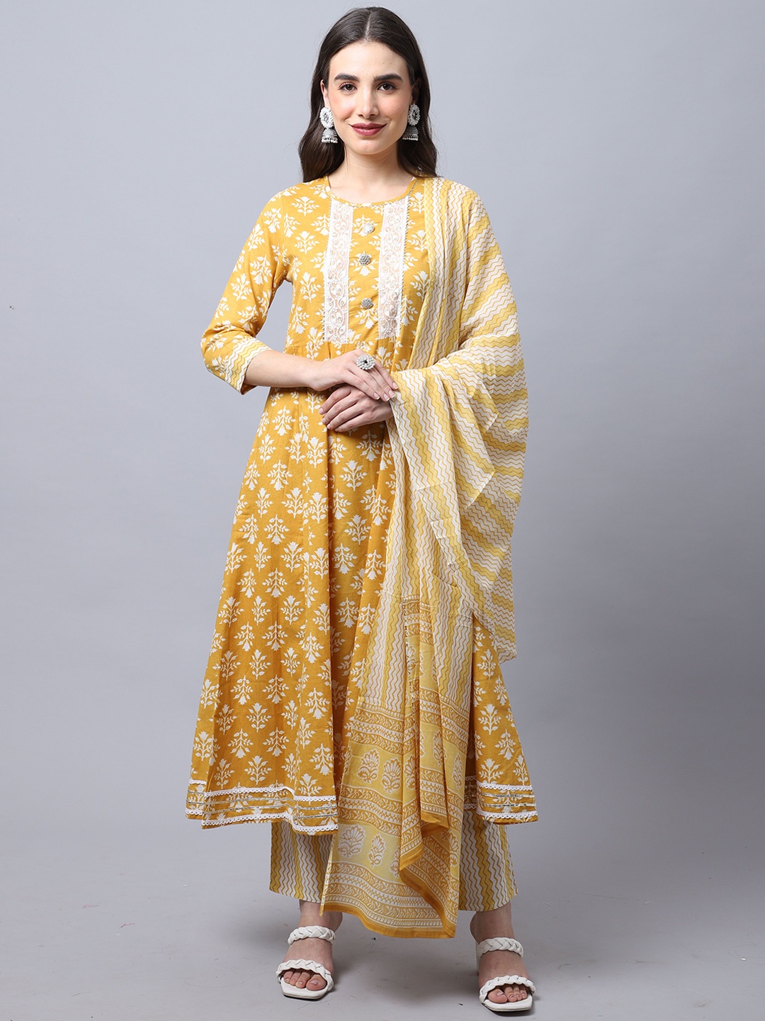 

KALINI Floral Printed Regular Gotta Patti Pure Cotton Kurti with Trousers & With Dupatta, Mustard