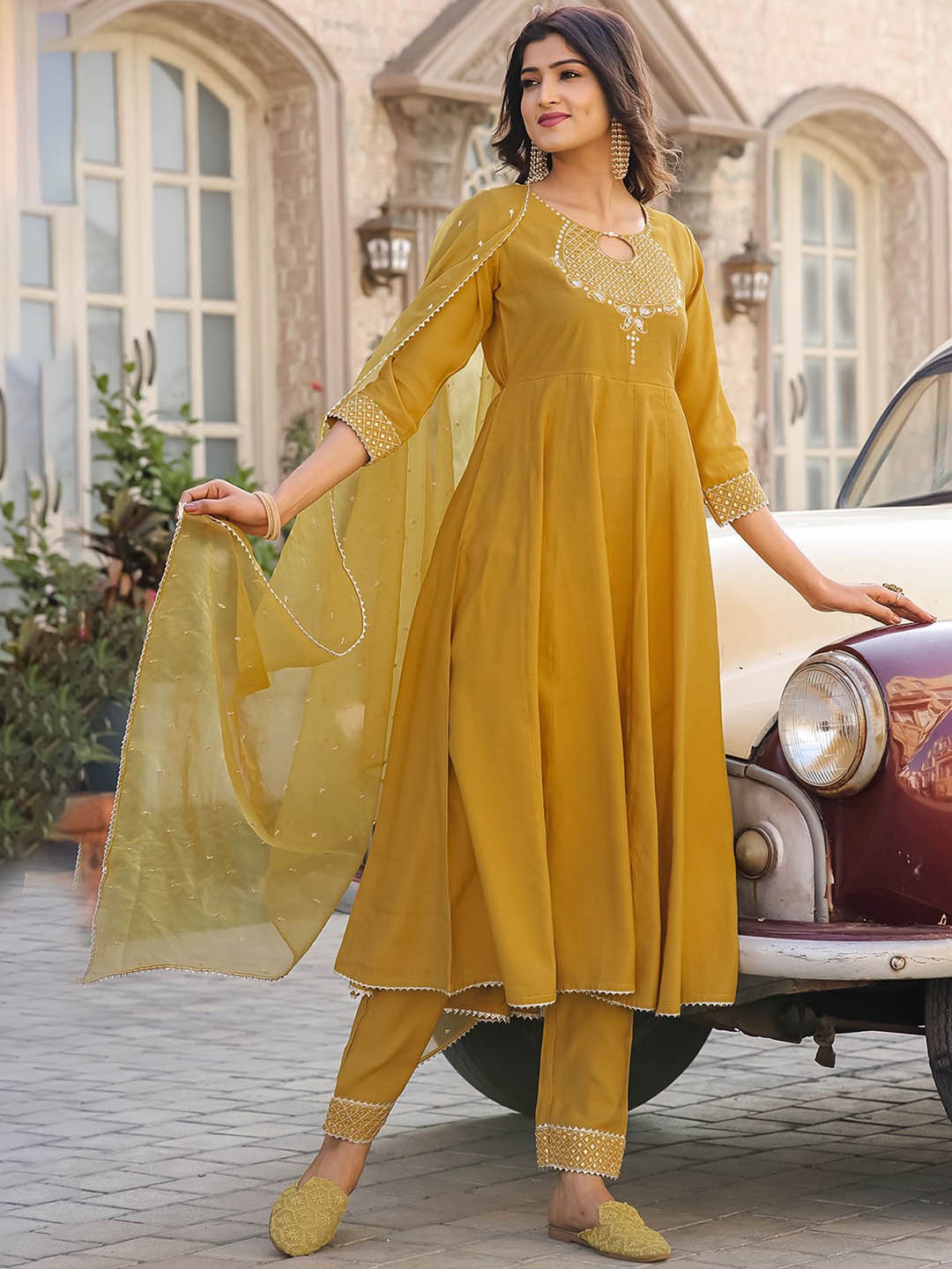 

KALINI Floral Embroidered Regular Anarkali Kurta with Trousers & With Dupatta, Mustard