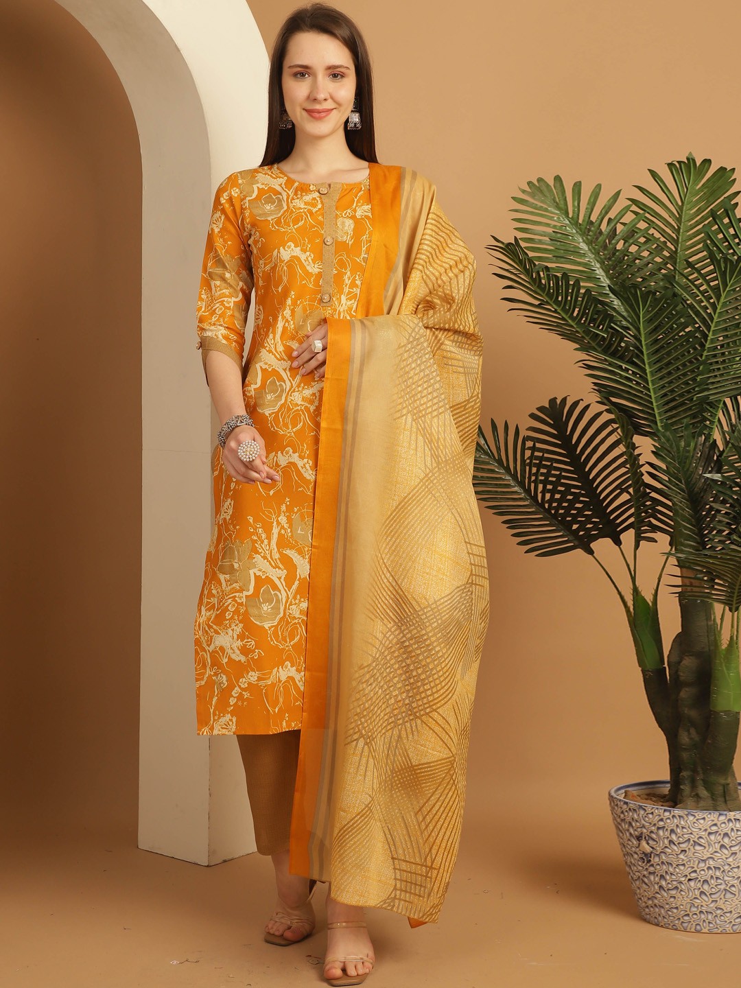 

KALINI Floral Printed Regular Round Neck Straight Kurta With Trousers & Dupatta, Mustard