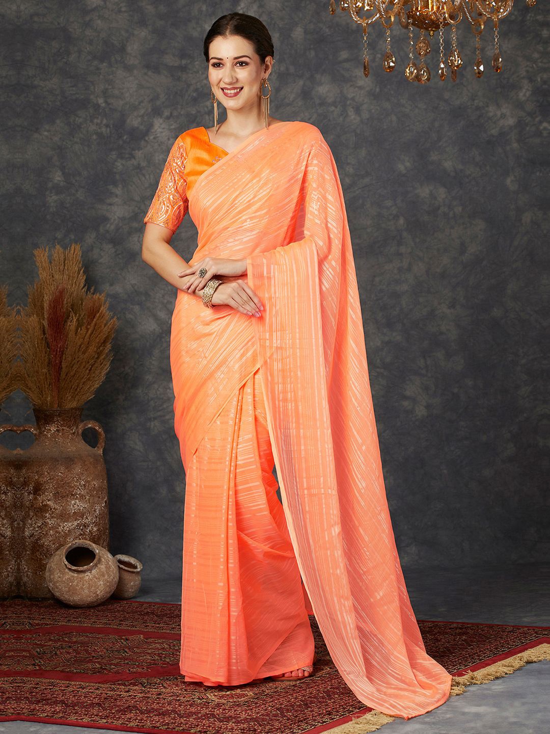 

KALINI Striped Pure Georgette Saree With Sequinned Blouse, Orange