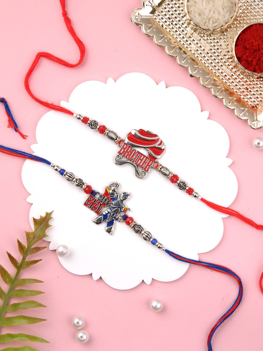 

Aapno Rajasthan Set Of 2 Silver Funky Brother Rakhi With Roli Chawal & Greetings Card