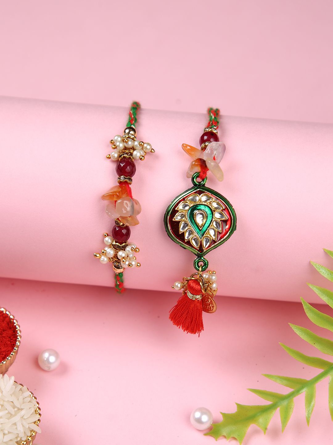 

Aapno Rajasthan Beaded Bhaiya Bhabhi Rakhi With Roli Chawal & Greetings Card, Red
