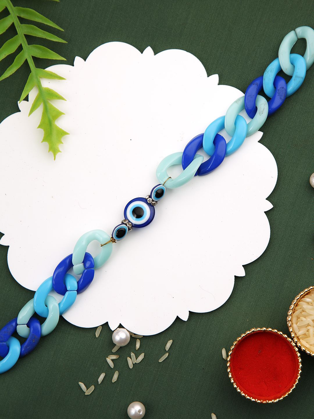 

Aapno Rajasthan Shades Of Blue Men Evil Eye Beaded Thread Rakhi