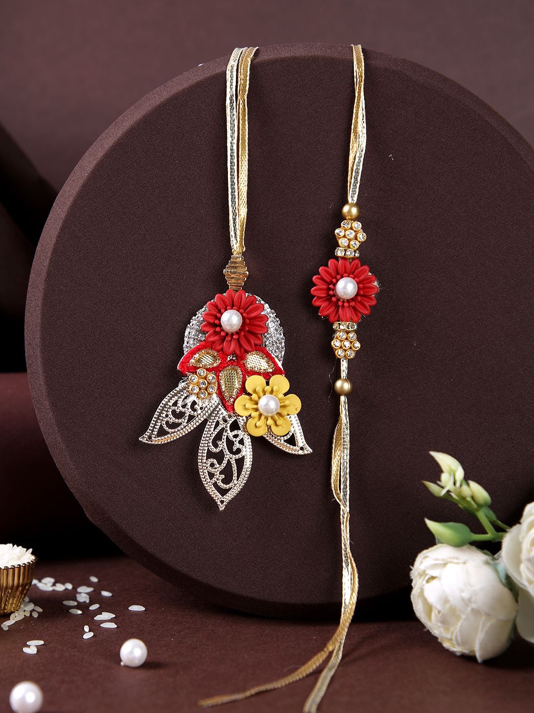 

Aapno Rajasthan Beaded Thread Bhaiya Bhabhi Rakhi with Roli Chawal & Greetings Card, Red