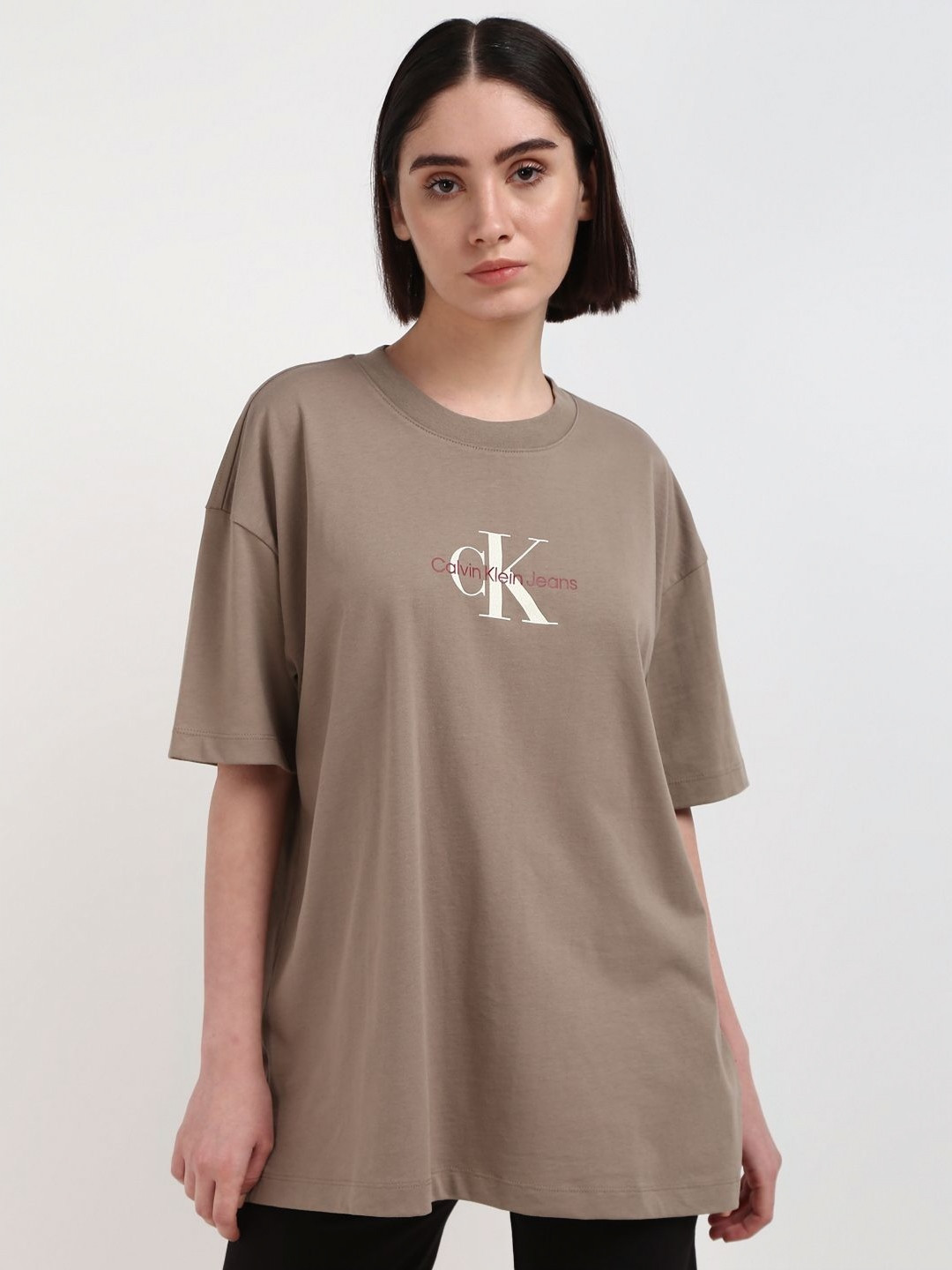 

Calvin Klein Jeans Women Printed Round Neck Cotton Oversized T-Shirt, Brown