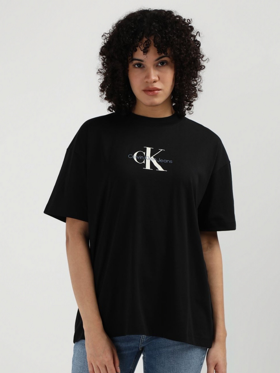 

Calvin Klein Jeans Women Printed Round Neck Cotton Oversized T-Shirt, Black