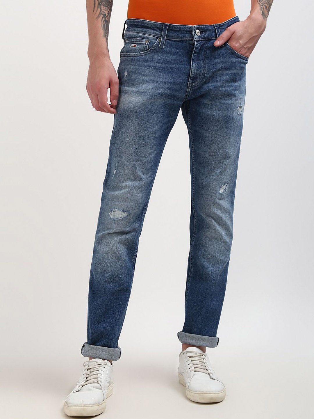 

Tommy Hilfiger Men Slim Fit Low Distressed Heavy Fade Cat Scratches Stretchable Jeans, Blue