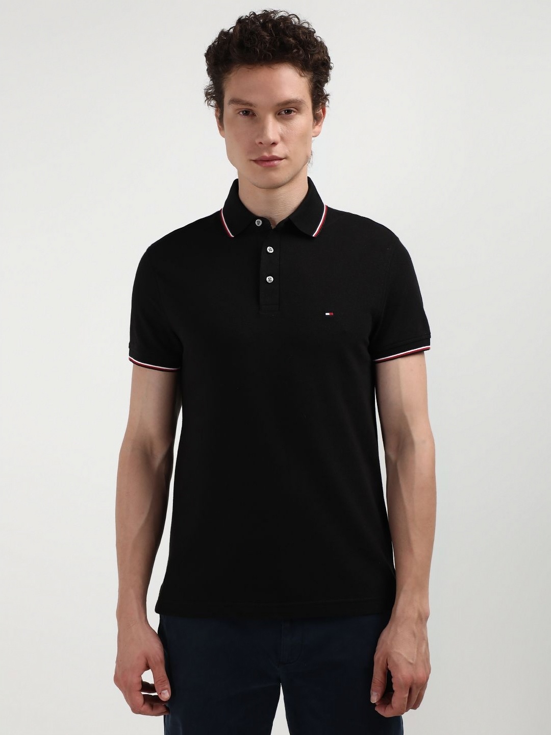 

Tommy Hilfiger Men Solid Polo Collar Organic Cotton Slim Fit T-shirt, Black