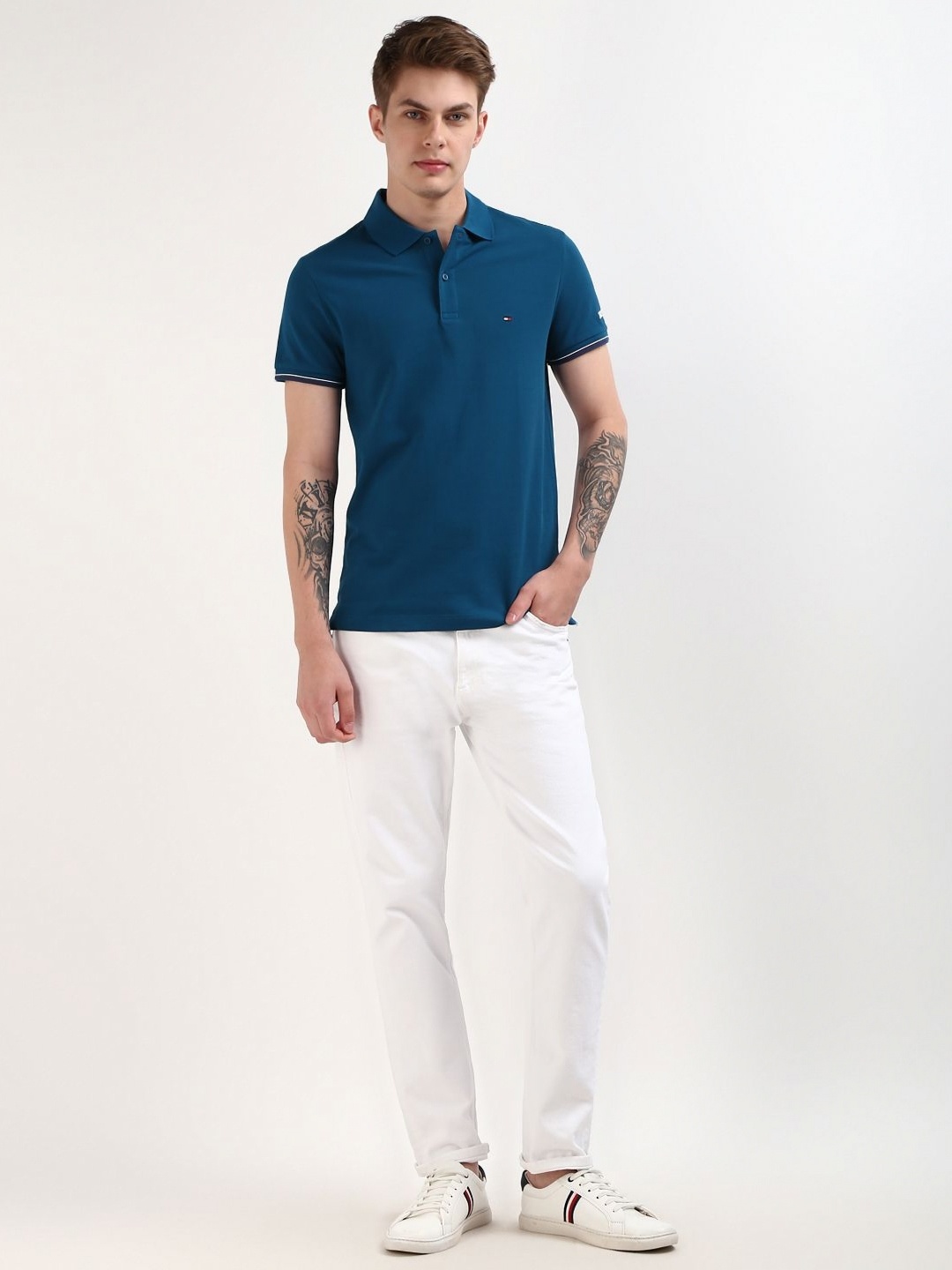 

Tommy Hilfiger Men Solid Polo Collar Organic Cotton Slim Fit T-shirt, Blue