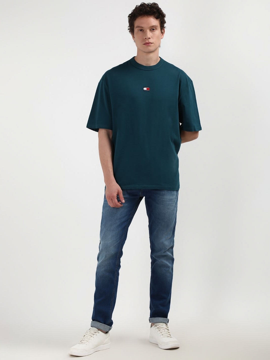 

Tommy Hilfiger Men Solid Round Neck Pure Cotton Relaxed Fit T-shirt, Teal