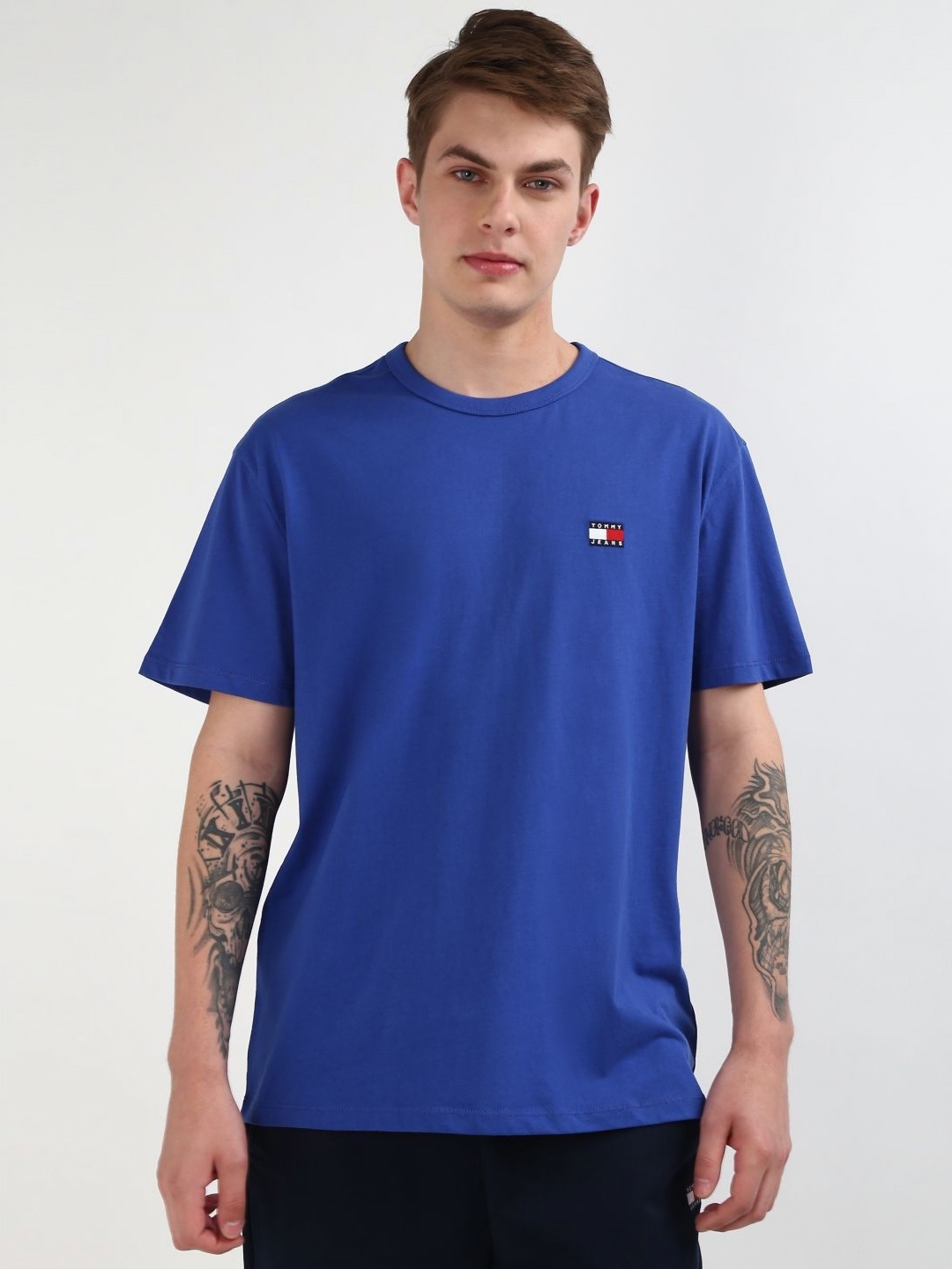 

Tommy Hilfiger Men Solid Round Neck Pure Cotton T-shirt, Blue