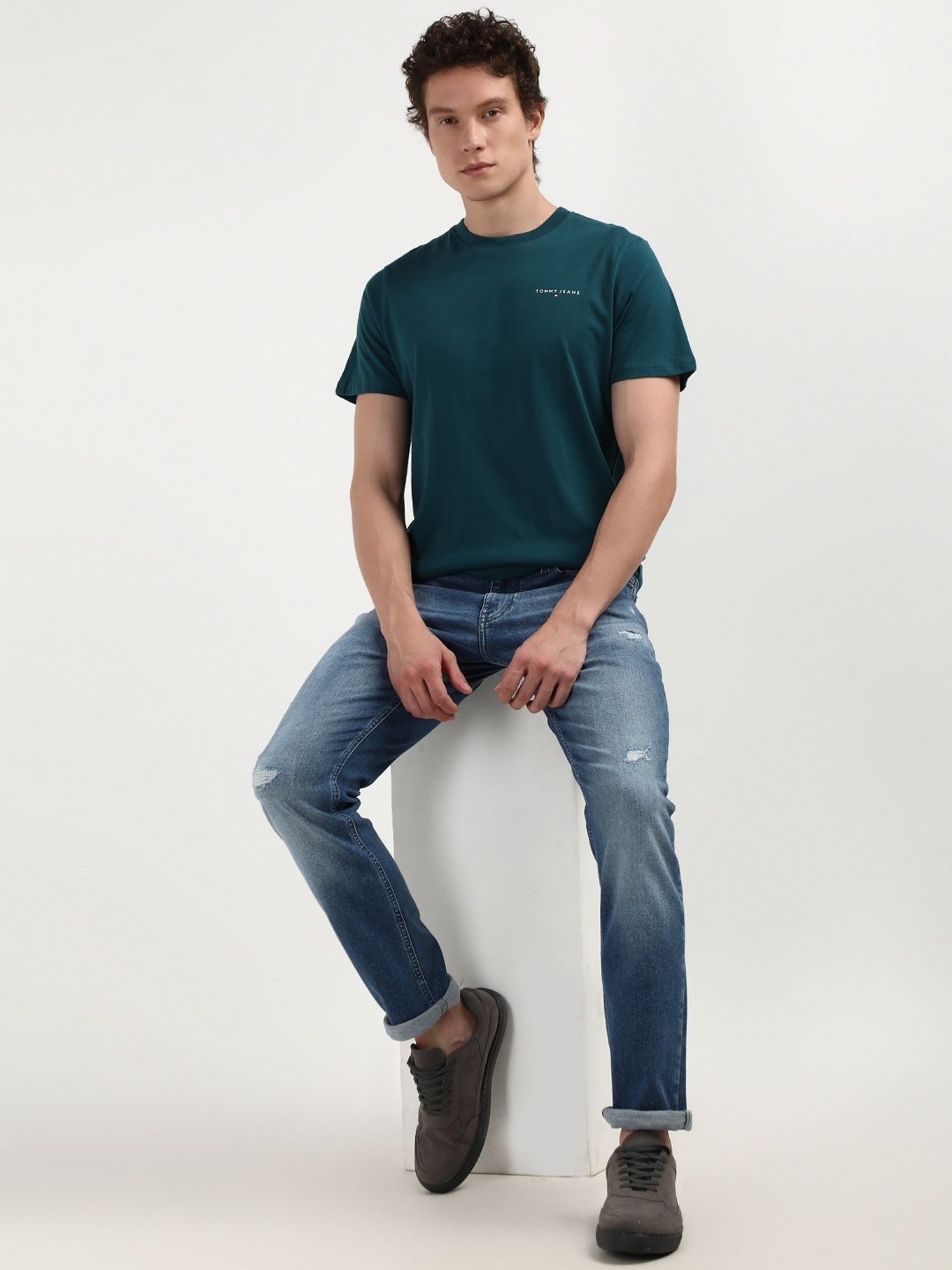 

Tommy Hilfiger Men Solid Round Neck Pure Cotton Slim Fit T-shirt, Teal