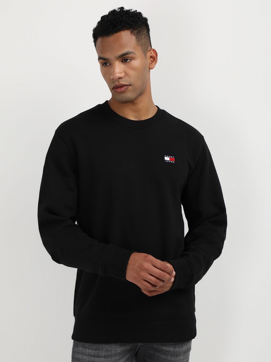 

Tommy Hilfiger Men Solid Long Sleeves Sweatshirt, Black