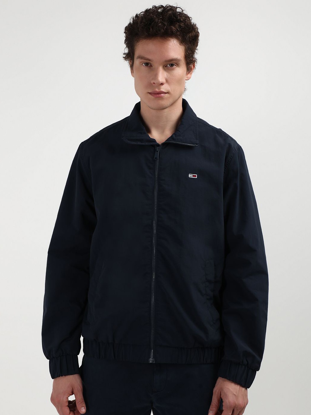 

Tommy Hilfiger Men Solid Crop Sporty Jacket with Patchwork, Navy blue