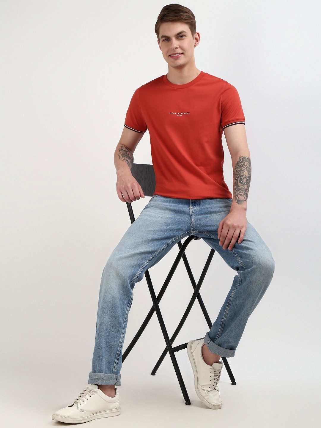 

Tommy Hilfiger Men Solid Round Neck Pure Cotton Slim Fit T-shirt, Red