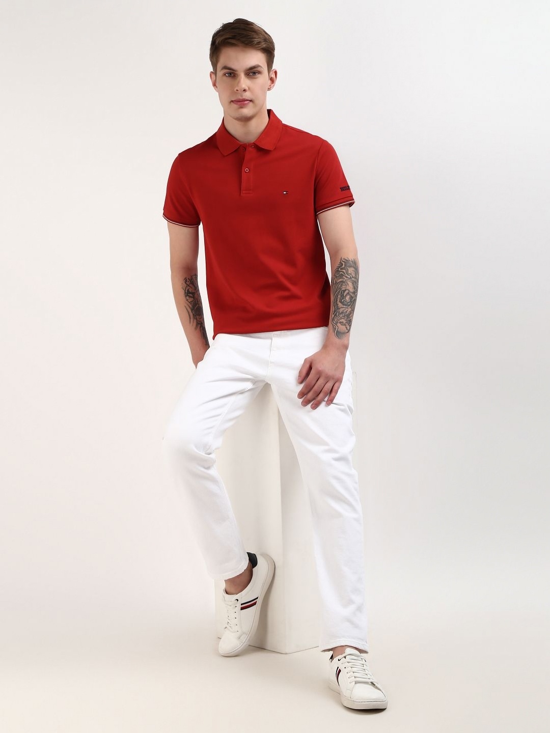 

Tommy Hilfiger Men Solid Polo Collar Organic Cotton Slim Fit T-shirt, Red