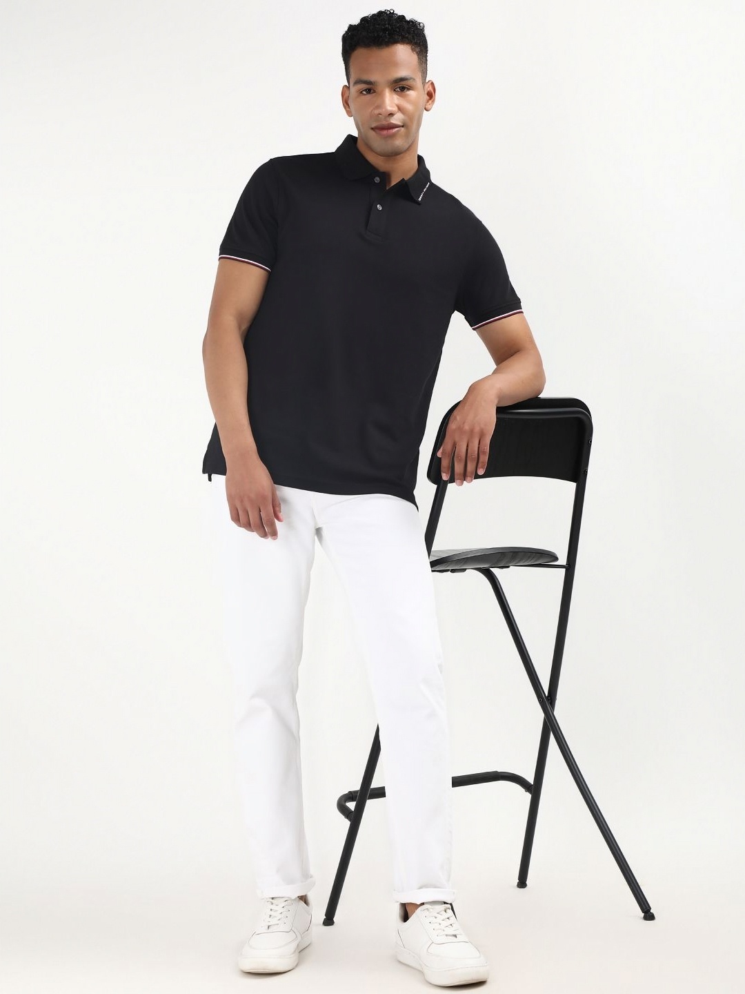 

Tommy Hilfiger Men Solid Polo Collar Organic Cotton T-shirt, Black